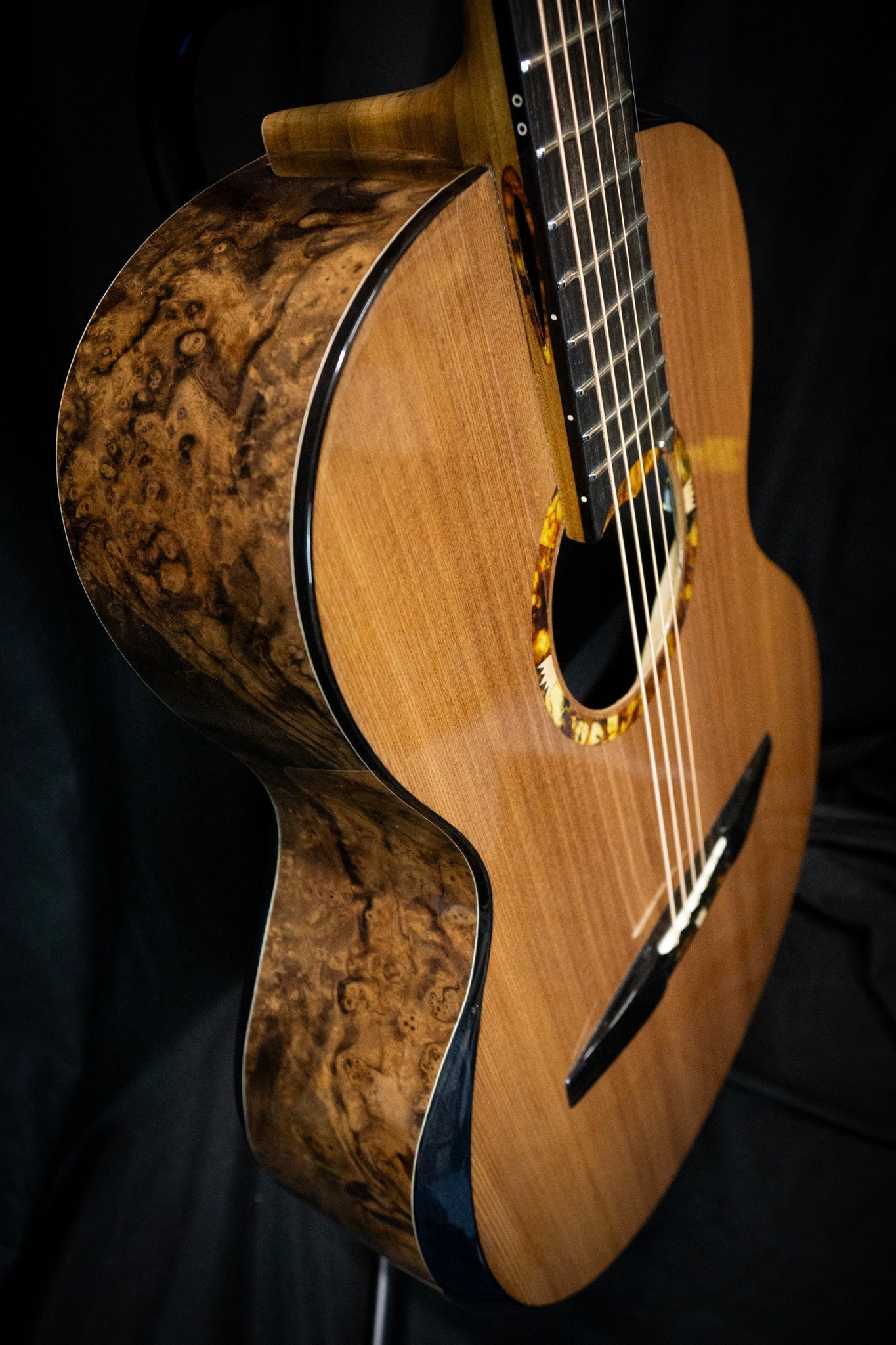 What Is the Purpose of the Elevated Fingerboard? - WM Guitars